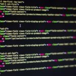 Detailed close-up of HTML code on a computer monitor, showcasing web development.