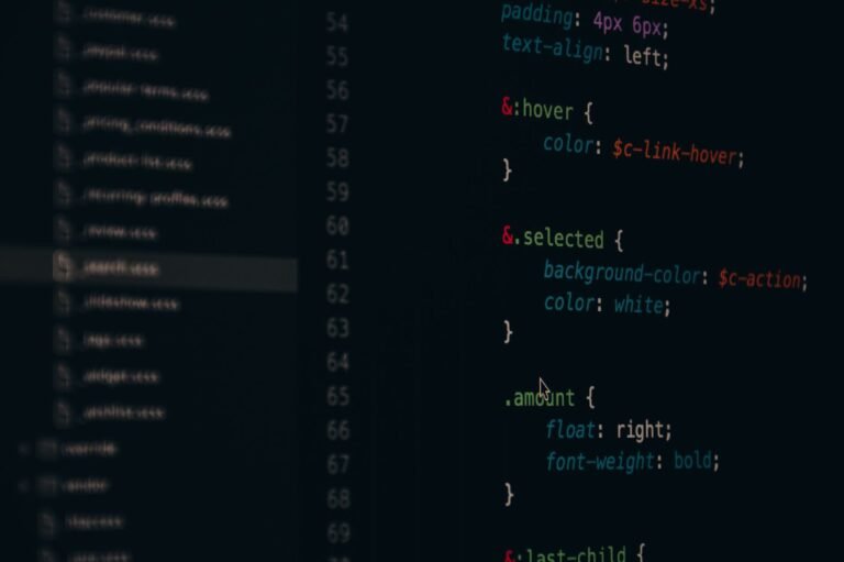 Close-up of colorful CSS code lines on a computer screen for web development.